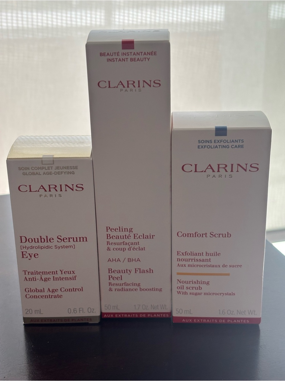 Clarins Skincare Trio — all full-size and brand new in boxes